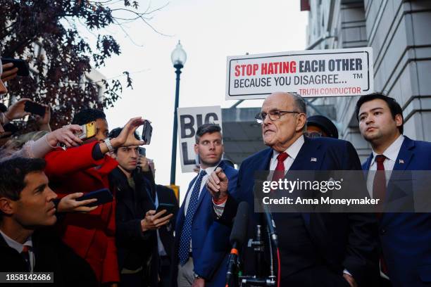 Rudy Giuliani, the former personal lawyer for former U.S. President Donald Trump, speaks with reporters outside of the E. Barrett Prettyman U.S....