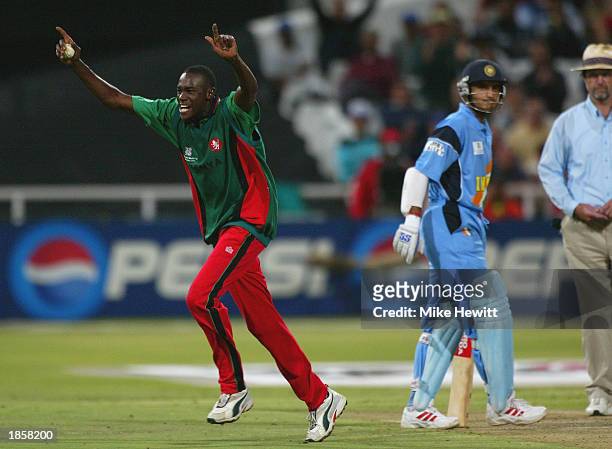 Collins Obuya of Kenya celebrates the wicket of Rahul Dravid of Kenya during the ICC Super Six World Cup match between Kenya and India held on March...