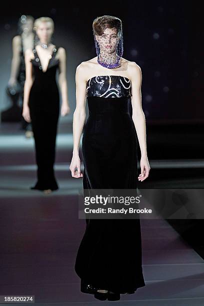 Model walks the runway during the Armani - One Night Only New York>> at SuperPier on October 24, 2013 in New York City.