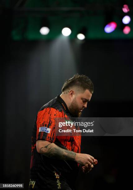 Michael Smith of England during his second round match against Kevin Doets of the Netherlands on Day One of 2023/24 Paddy Power World Darts...