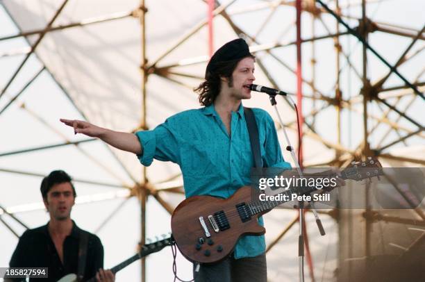 Mike Scott of The Waterboys performs on stage at Milton Keynes Bowl, on June 21st, 1986 in Milton Keynes, England. Bass player Anthony Hutchinson is...