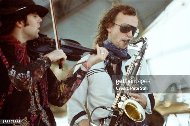 Steve Wickham and Anthony Thistlethwaite of The Waterboys performs on stage at Milton Keynes Bowl, on June 21st, 1986 in Milton Keynes, England.