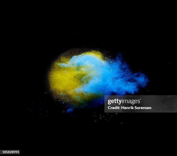 explosion of colored powder - powder blue imagens e fotografias de stock