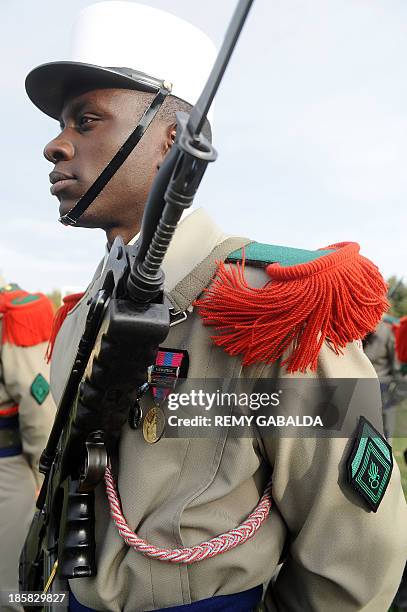 French soldier of the 4th regiment of the Foreign Legion stands on October 25, 2013 at the Bel Air farm near the southwestern French town of...