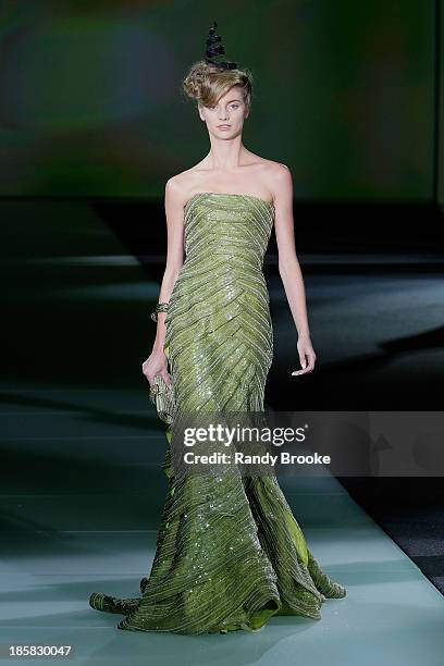 Model walks the runway during the Armani - One Night Only New York at SuperPier on October 24, 2013 in New York City.