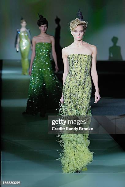 Model walks the runway during the Armani - One Night Only New York at SuperPier on October 24, 2013 in New York City.