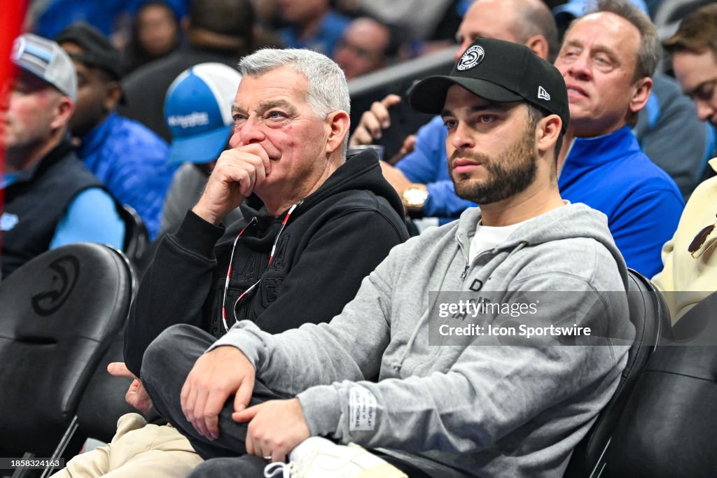Atlanta Hawks owner Tony Ressler and son Nick Ressler watch the... News ...