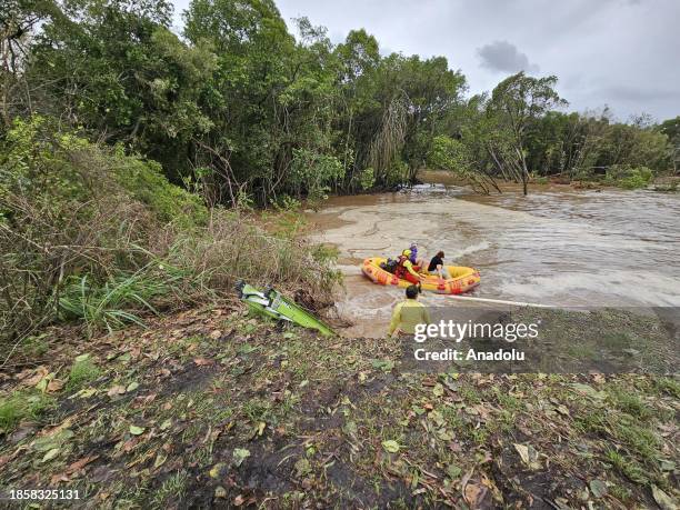 Personnel conduct search and rescue operations in the flooded area in Queensland, Australia on December 18, 2023. More than 300 rescued from...