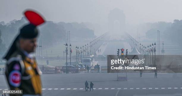 View of Kartvya Path near India Gate reveals heavy smog on a cold morning as air pollution levels rise on December 18, 2023 in New Delhi, India.