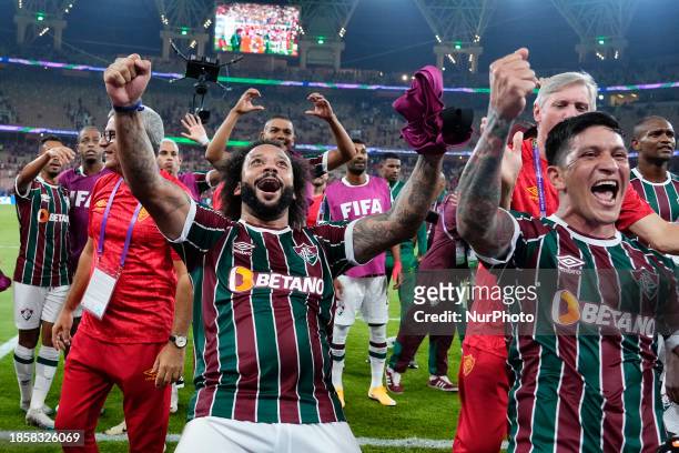Marcelo left-back of Fluminense and Brazil and German Cano centre-forward of Fluminense and Argentina celebrates victory after the FIFA Club World...
