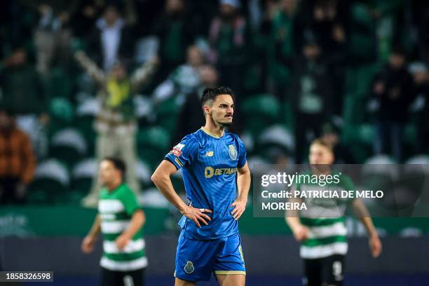 Porto's Canadian midfielder Stephen Eustaquio reacts after Sporting's Portuguese midfielder Pedro Goncalves scored during the Portuguese League...