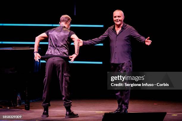 Marco Masini and Giorgio Panariello perform at Teatro Arcimboldi on December 15, 2023 in Milan, Italy.