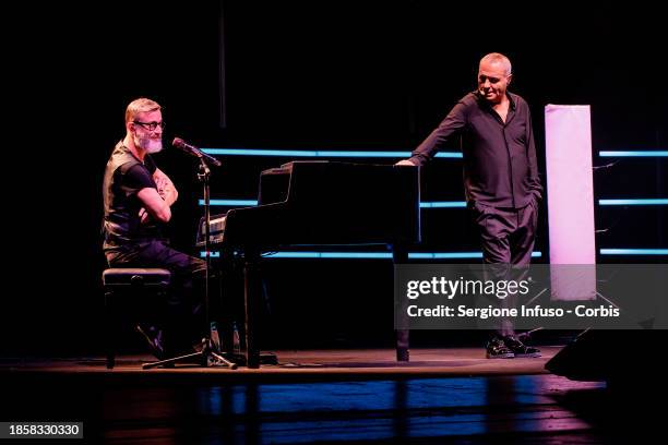 Marco Masini and Giorgio Panariello perform at Teatro Arcimboldi on December 15, 2023 in Milan, Italy.