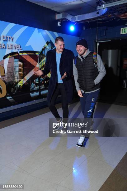 Nikola Jokic of the Denver Nuggets and Luka Doncic of the Dallas Mavericks arrive to the arena before the game on December 18, 2023 at the Ball Arena...