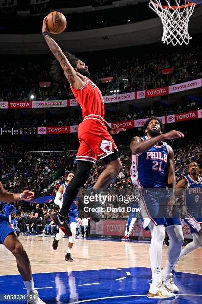 Coby White of the Chicago Bulls dunks the ball during the game against the Philadelphia 76ers on December 18, 2023 at the Wells Fargo Center in...