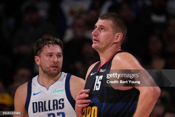 Nikola Jokic of the Denver Nuggets looks on during the game against the Dallas Mavericks on December 18, 2023 at the Ball Arena in Denver, Colorado....