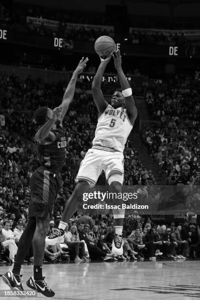 Anthony Edwards of the Minnesota Timberwolves shoots the ball during the game against the Miami Heat on December 18, 2023 at Kaseya Center in Miami,...