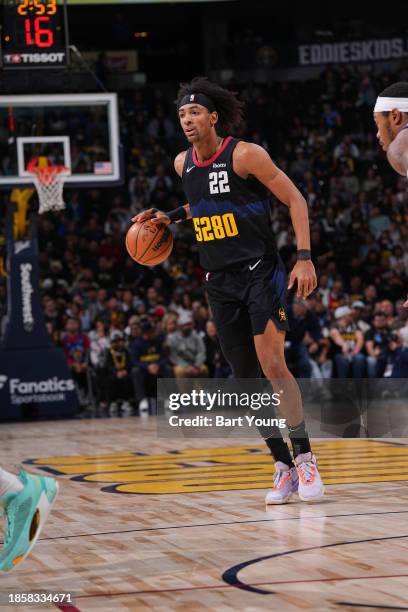 Zeke Nnaji of the Denver Nuggets handles the ball during the game against the Dallas Mavericks on December 18, 2023 at the Ball Arena in Denver,...