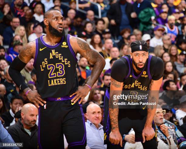 LeBron James of the Los Angeles Lakers & Anthony Davis of the Los Angeles Lakers looks on during the game on December 18, 2023 at Crypto.Com Arena in...