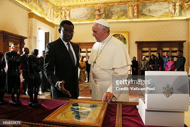 Pope Francis exchanges gifts with the President of the Republic of Equatorial Guinea, Teodoro Obiang Nguema Mbasogo During an audience at his private...
