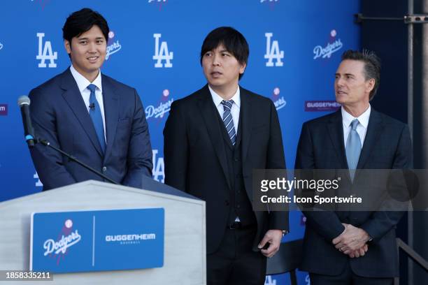 Newly acquired Los Angeles Dodgers two-way player Shohei Ohtani and translator Ippei Mizuhara and agent Nez Balelo at the introductory press...