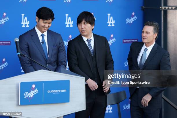 Newly acquired Los Angeles Dodgers two-way player Shohei Ohtani and translator Ippei Mizuhara and agent Nez Balelo at the introductory press...