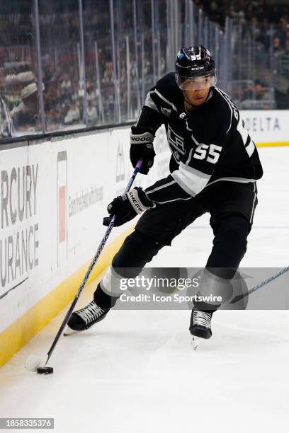 Los Angeles Kings right wing Quinton Byfield skates with the puck during an NHL hockey game against the Winnipeg Jets on December 13, 2023 at...