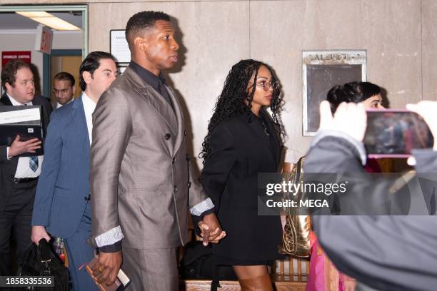 Jonathan Majors and Meagan Good are seen arriving at Criminal Court on December 18, 2023 in New York, New York.