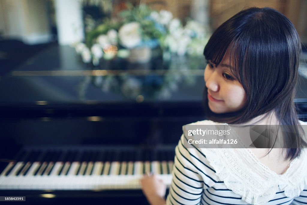 Girl with piano