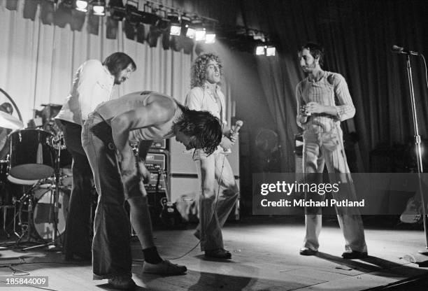 English rock group The Who on stage, October 1973. Left to right: bassist John Entwistle , drummer Keith Moon , singer Roger Daltrey and guitarist...