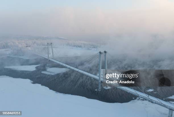 An aerial view of the Communal Bridge during the winter season as the temperature is minus 30 degrees in Krasnoyarsk, Russia on December 18, 2023. It...