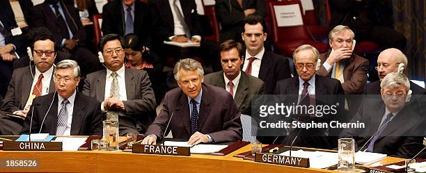 French Foreign Minister Dominique de Villepin , flanked by Chinese Foreign Minister Wen Jiabao and German Foreign Minister Joschk Fischer , addresses...