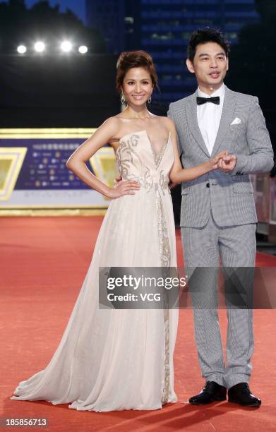 Hostess Patty Wu and host Ken attend the red carpet of the 48th Golden Bell Award on October 25, 2013 in Taipei, Taiwan of China.