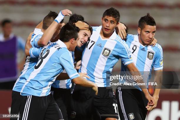Matias Sanchez of Argentina celebrates his team's second goal with team mates during the FIFA U-17 World Cup UAE 2013 Group E match between Argentina...