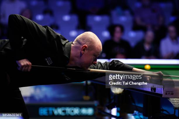 Chris Wakelin of England plays a shot in the quarter-final match against Gary Wilson of England on day 5 of the 2023 BetVictor Scottish Open at the...