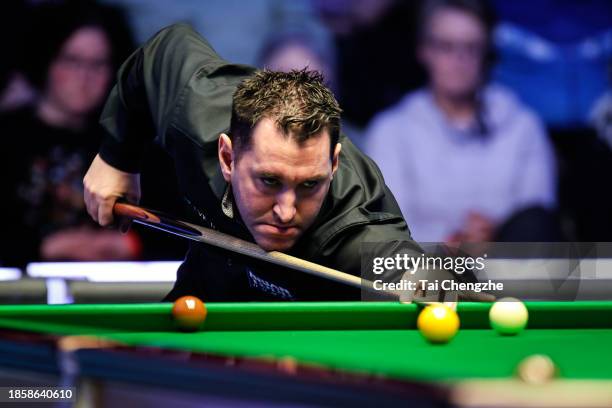 Tom Ford of England plays a shot in the quarter-final match against John Higgins of Scotland on day 5 of the 2023 BetVictor Scottish Open at the...