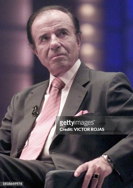 Former Argentine President Carlos Menem takes part in a television show in Santiago, Chile, 21 March 2001, where he confirmed his upcoming wedding...