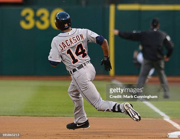 Austin Jackson of the Detroit Tigers runs the bases during Game One of the American League Division Series against the Oakland Athletics at O.co...