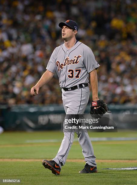 Max Scherzer of the Detroit Tigers walks to the dugout during Game One of the American League Division Series against the Oakland Athletics at O.co...