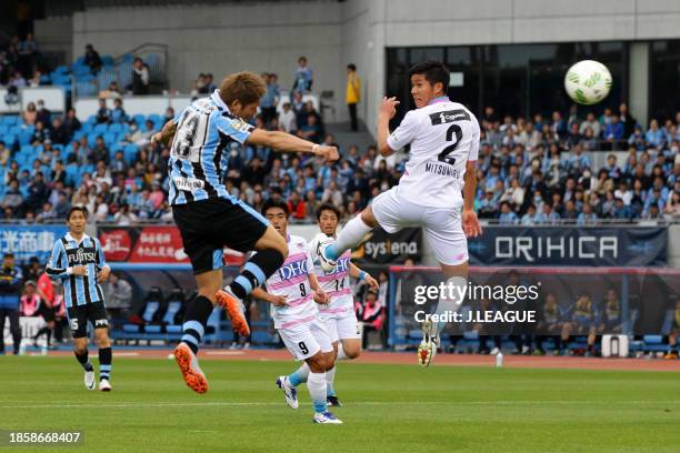 Yoshito Okubo of Kawasaki Frontale heads to score the team's first goal during the J.League J1 first stage match between Kawasaki Frontale and Sagan...