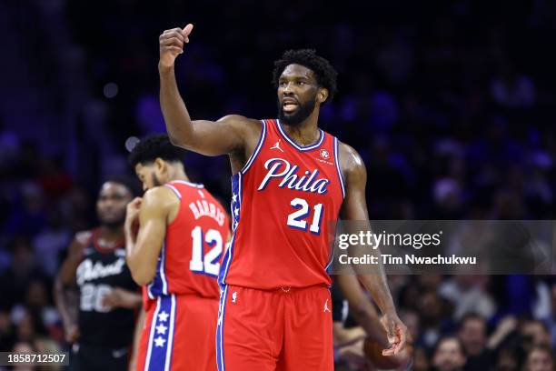 Joel Embiid of the Philadelphia 76ers reacts during the second quarter against the Detroit Pistons at the Wells Fargo Center on December 15, 2023 in...