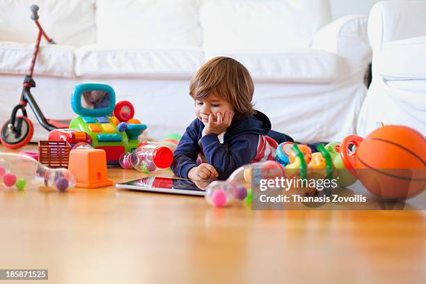 portrait of a small boy - child toy photos et images de collection