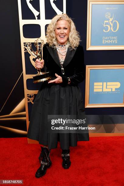 Alley Mills poses with the award for "Outstanding Guest Performance In A Daytime Drama Series" in the press room during the 50th Daytime Emmy Awards...