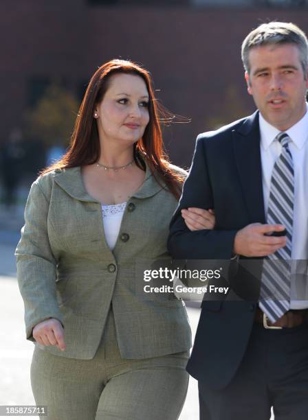 Gypsy Wills former mistress of Utah doctor Martin MacNeill leaves for the day with her attorney after she started to testify in the trial of MacNeill...