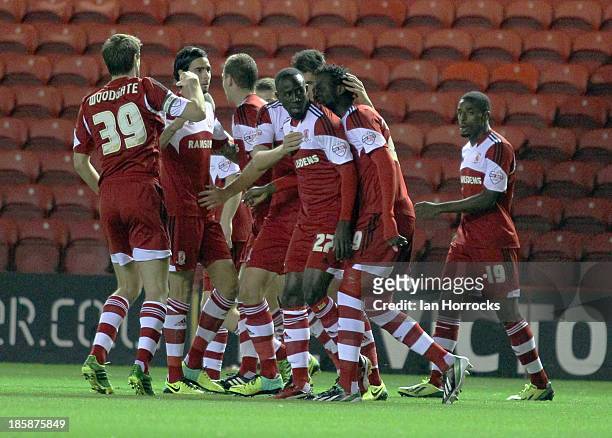 Albert Adomah celebrates with teammates after scoring the first goal for Middlesbrough during the Sky Bet Championship game between Middlesbrough and...