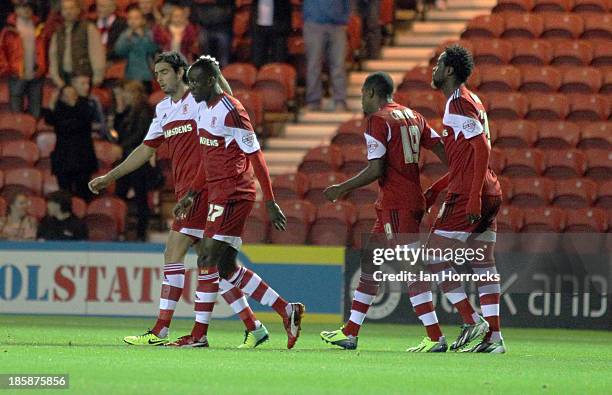 Albert Adomah is congratulated by team-mate Rhys Williams after scoring the first goal for Middlesbrough during the Sky Bet Championship game between...