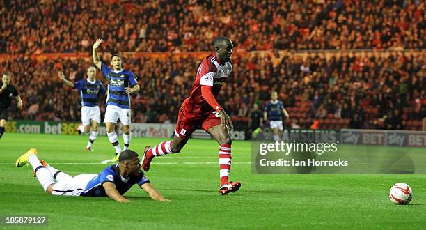 Albert Adomah of Middlesbrough brings down Doncaster's Reece Wabara during the Sky Bet Championship game between Middlesbrough and Doncaster Rovers...