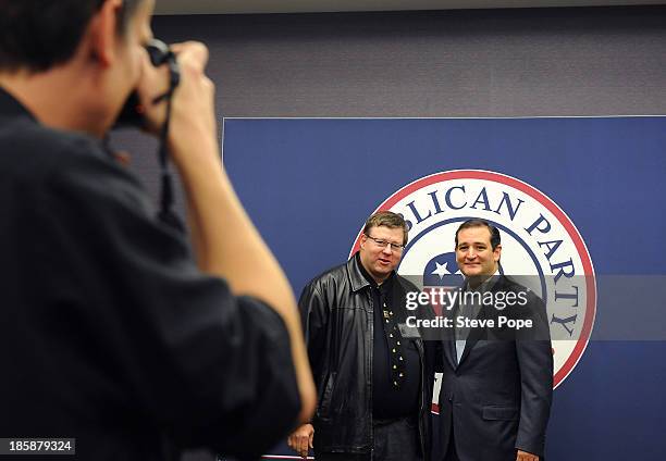 Senator Ted Cruz mugs with VIPs at a photo opportunity prior to speaking at the annual Ronald Reagan Commemorative Dinner October 25, 2013 in Des...