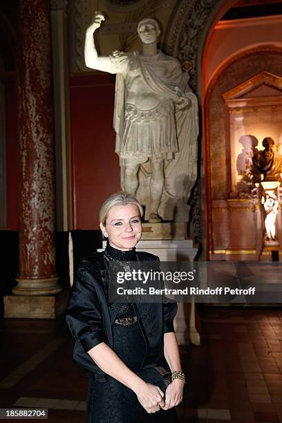 Egeria of artist Cesar, Stephanie Janssen, wearing a creation of Cesar, front of Jules Cesar Statue - Designer Alber Elbaz pays tribute to Cesar...