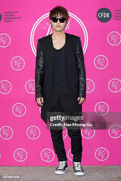 South Korean actor Jin Goo attends during at the 'Kwak Hyun-Joo' show on day five of the Seoul Fashion Week Spring/Summer 2014 at Yeoido Park on...